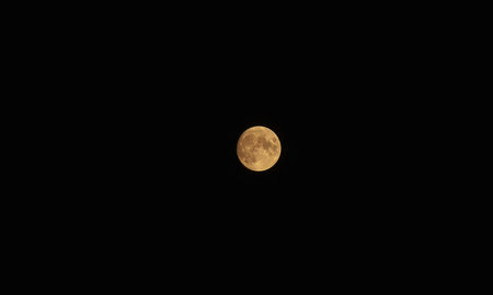 Full Moon A full moon is the lunar phase that occurs when the Moon is completely illuminated as seen from Earth.の写真素材