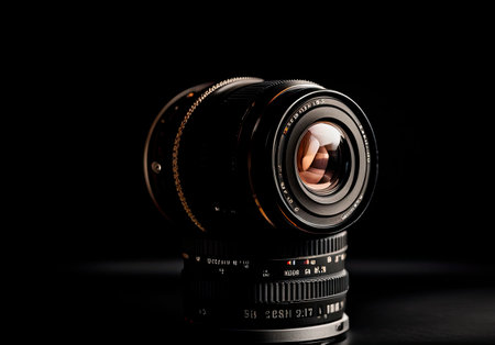 Photo Camera or Video lens close-up on black background.の素材