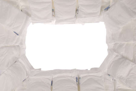 Pile of baby diapers on white. の写真素材