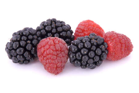 Raspberries and blackberries on white backgroundの写真素材