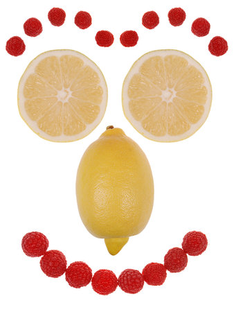 Funny face made from fruit isolated on white.の写真素材