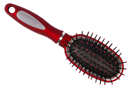 Red hair brush massage  Isolated on white  Clipping path included 