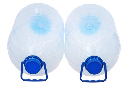 Two big bottles of water isolated on a white. Clipping path included.