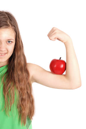Girl holding fresh apple isolated on whiteの写真素材