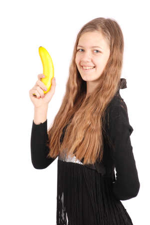 Girl holding fresh banana isolated on whiteの写真素材