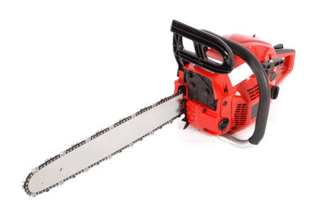 Red professional chainsaw isolated on white backgroundの写真素材