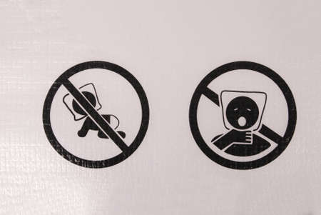 Warning signs on packaging of danger for childrenの写真素材