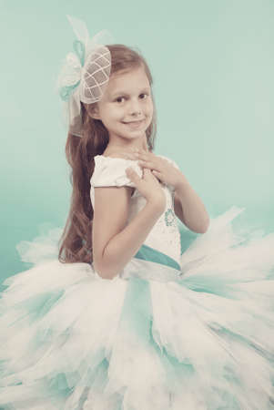 Beautiful happy smiling young girl vintage effectの写真素材