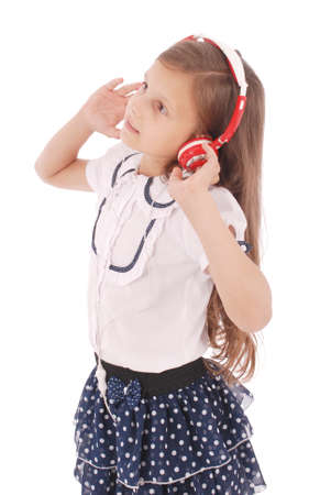 Happy young girl listening to music, isolated on whiteの写真素材