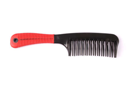 Elegant red hair comb brush with handle, isolated on transparent or white background. Front view.の写真素材