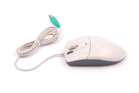 White computer optical mouse isolated on white background with soft shadowの写真素材