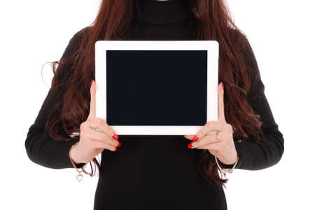 Teenage girl showing a blank horisontal tablet screen isolated on whiteの写真素材