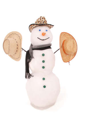 White snowman with scarf and three hat. On white background.の写真素材