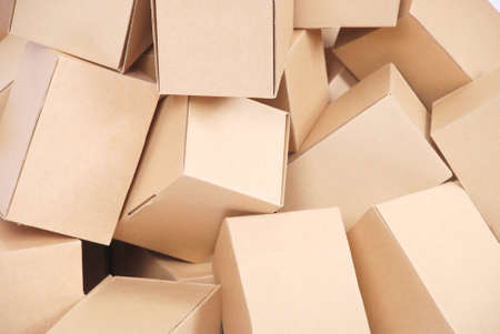 Cardboard boxes background on brown colorの写真素材