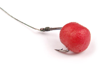 Cukk and hook, fishing baits, close up, floating baits for fish. Baits for carp. Fishing gear....