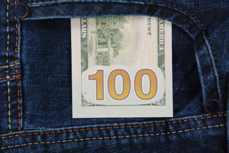 Cash, money is in the pocket of blue jeans. Close upの写真素材