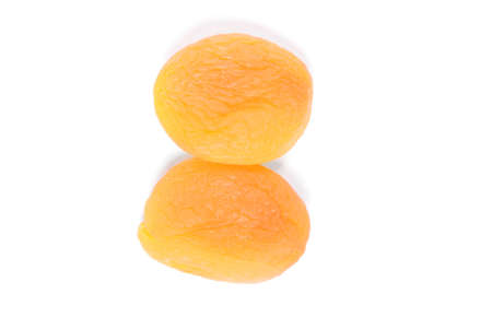 Dried apricot. In high resolution. Isolated on the white backgroundの写真素材