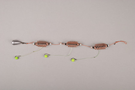 Bait fishing for carp isolated on gray background with soft shadow