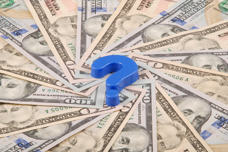 Question mark on mandala kaleidoscope from money. Abstract money background raster pattern repeat mandala circle.の写真素材