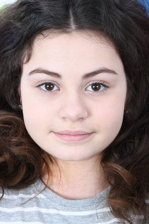 Beautiful girl face close up beauty lips and hair in striped T-shirtの写真素材