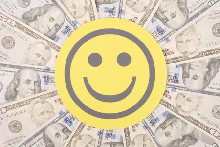 Smile faces on mandala kaleidoscope from money. Abstract money background raster pattern repeat...