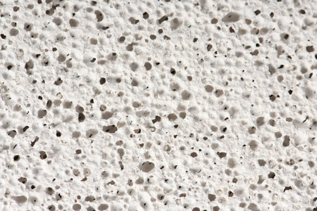 Macro of pumice stone. Grey porosity Stone, rough pumice texture background. High resolution photo....