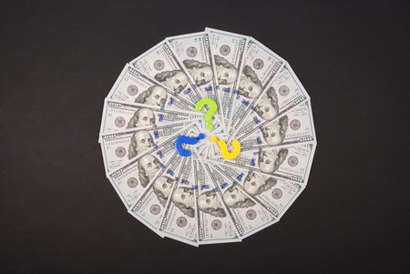 Question mark on mandala kaleidoscope from money. Abstract money background raster pattern repeat...