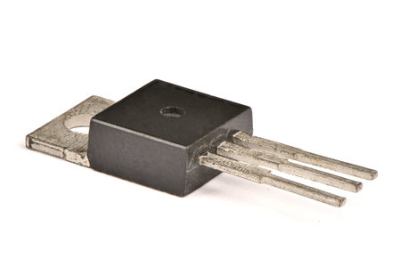 Electronic transistor isolated on white background. Macro shot. High resolution photo. Full depth of...