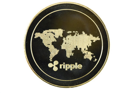 Back side of the crypto currency golden ripple isolated on white background. High resolution photo....