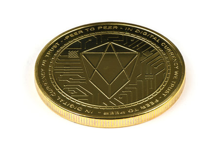 Face of the crypto currency golden EOS isolated on white background. High resolution photo. Full...