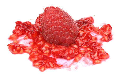 Smashed raspberries isolated on white background. High resolution photo. Full depth of field.