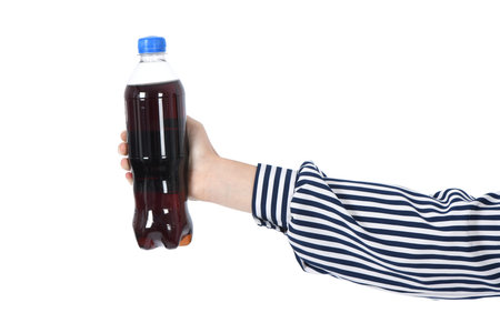 Child drinking Cola from bottle. On white background. High resolution photo. Full depth of field.の写真素材