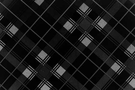 Spotted black and white grunge. Abstract halftone background. Trendy weave texture. Monochrome...