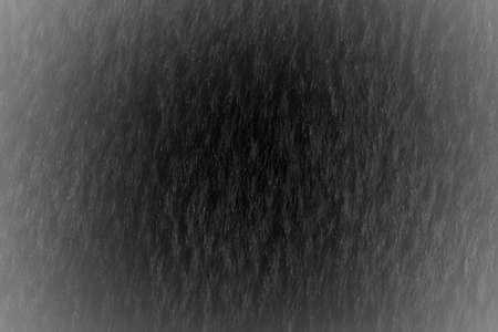 Black jersey fabric texture background. High resolution photo. Full depth of field.の写真素材