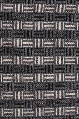 The texture of a knitted wool brown. Background. High resolution photo. Full depth of field.