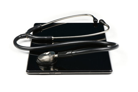 Stethoscope on tablet pc isolated on white background. High resolution photo. Full depth of field.