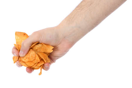 Male hand holding potato chips. Isolated on white background. High resolution photo. Full depth of field.の写真素材
