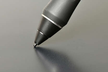Close-up graphic design digitized pen on tablet background. High resolution photo.の写真素材