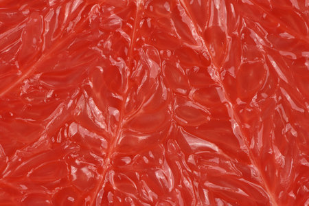 Texture of fresh ripe grapefruit. Closeup macro of grapefruit pulp. High resolution photo. Full...
