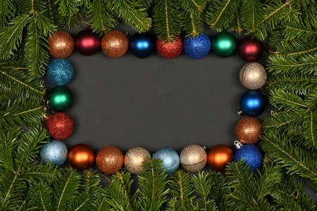 Spruce branch and christmas decorations isolated on black background. High resolution photo. Full depth of field.の写真素材