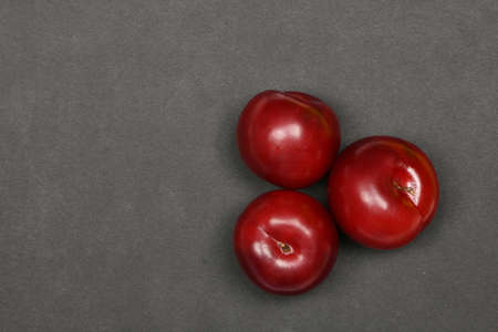 Ripe plum fruit isolated on black background. High resolution photo. Full depth of field.の写真素材