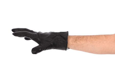 Man wearing black leather glove on white background, closeup. side view. High resolution photo. Full depth of field.の写真素材