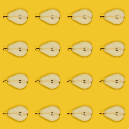 Pears isolated on yellow background. Pears seamless texture or background. High resolution photo. Full depth of field.の写真素材