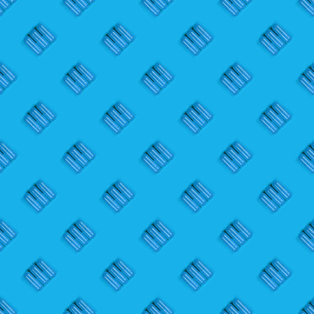 Seamless pattern. Pharmaceutical pills, medicine for people's health to heal diseases. Yellow tablets on blue background. High resolution pattern. Full depth of field.の写真素材