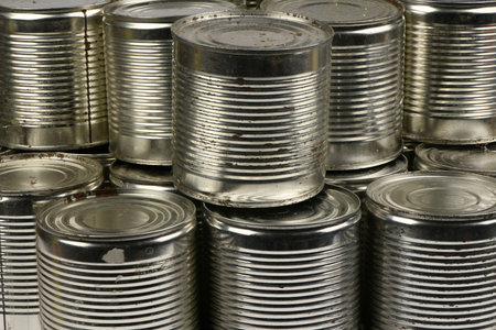 Open old metal tin cans background. High resolution photo. Full depth of field.