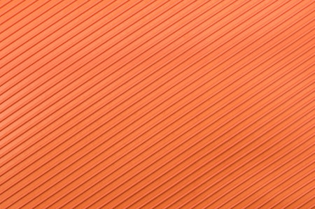 Texture of orange studded rubber flooring panel for texture or background. Bright Orange Rubber...