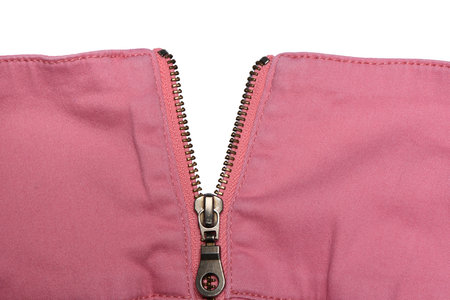 Pink jeans zipper. Close-up of women's jeans, jeans with zipper. Jeans concept, casual wear concept,...