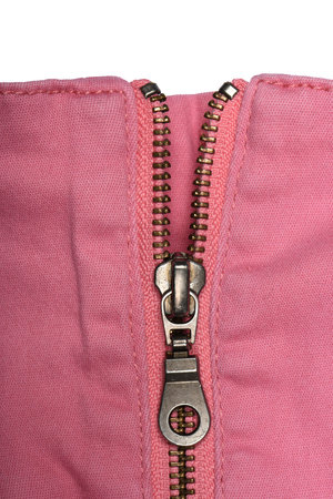 Pink jeans zipper. Close-up of women's jeans, jeans with zipper. Jeans concept, casual wear concept, jeans as casual wear.の写真素材