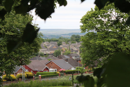 A beautiful rural view over the village and in to the English countryside on a cloudy summer...