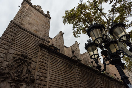 Scenic Barcelona church wall vista, Catalonia, along La Ramblaのeditorial素材
